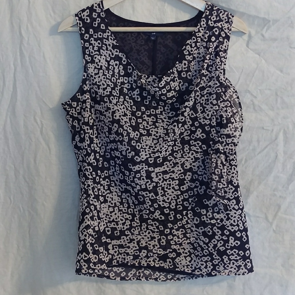 Layered sheer sleeveless top w/asymmetrical ruf